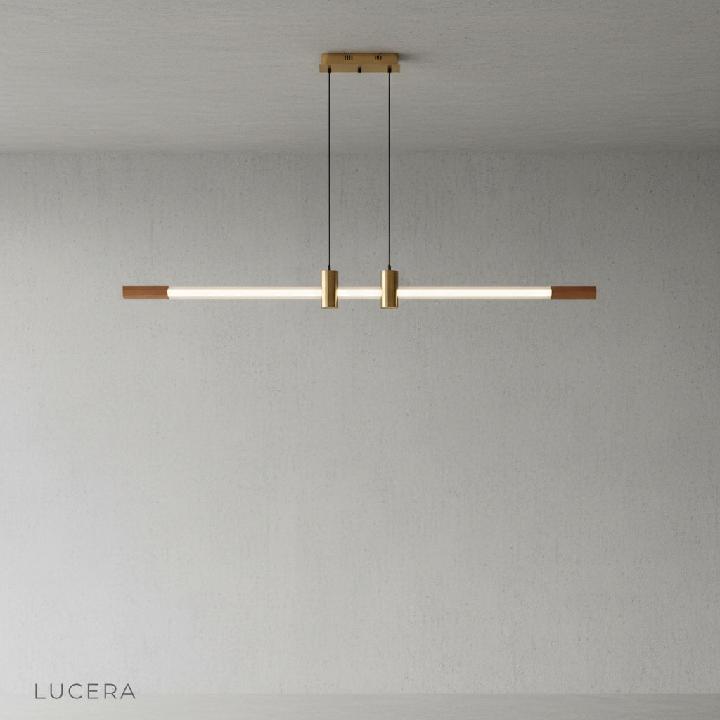 Close-up of Gideon pendant light glass neon tube emitting a subtle warm amber glow