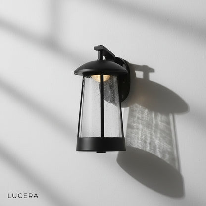 Close-up of Camille wall lamp anti-corrosion aluminum frame and glass texture