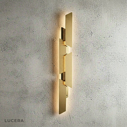 Myelin wall lamp angled view showing sleek metallic arm and dome shade