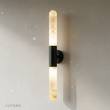 close-up of Zone Wall Lamp showing alabaster texture and sleek copper metal stem