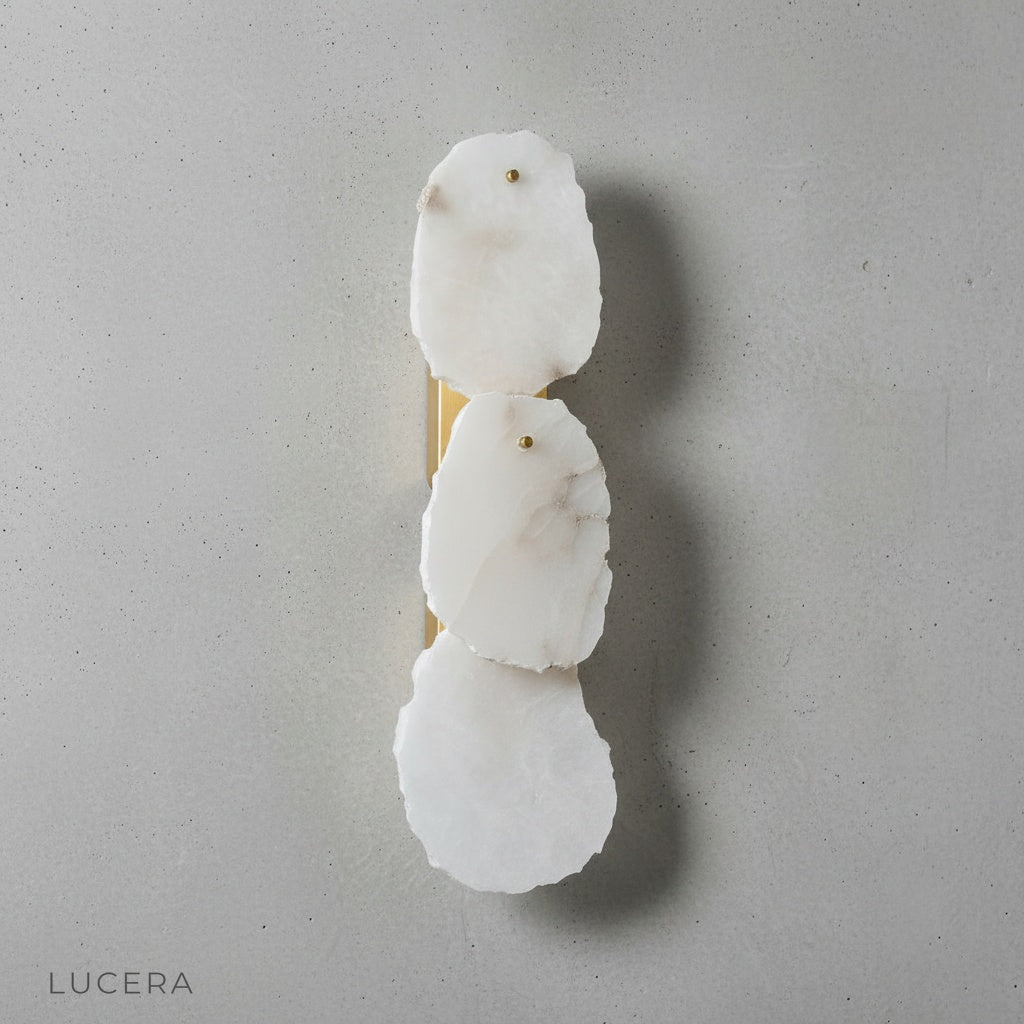 close-up of Esker wall lamp alabaster marble texture and copper details