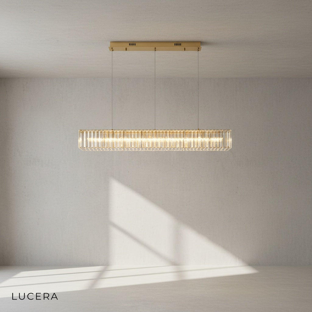Detail view of the Art-Deco geometric metalwork and hanging crystal strands on Ivar chandelier