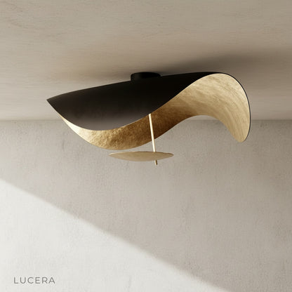 Xenial ceiling lamp close-up of flowing organic curves and diffuser