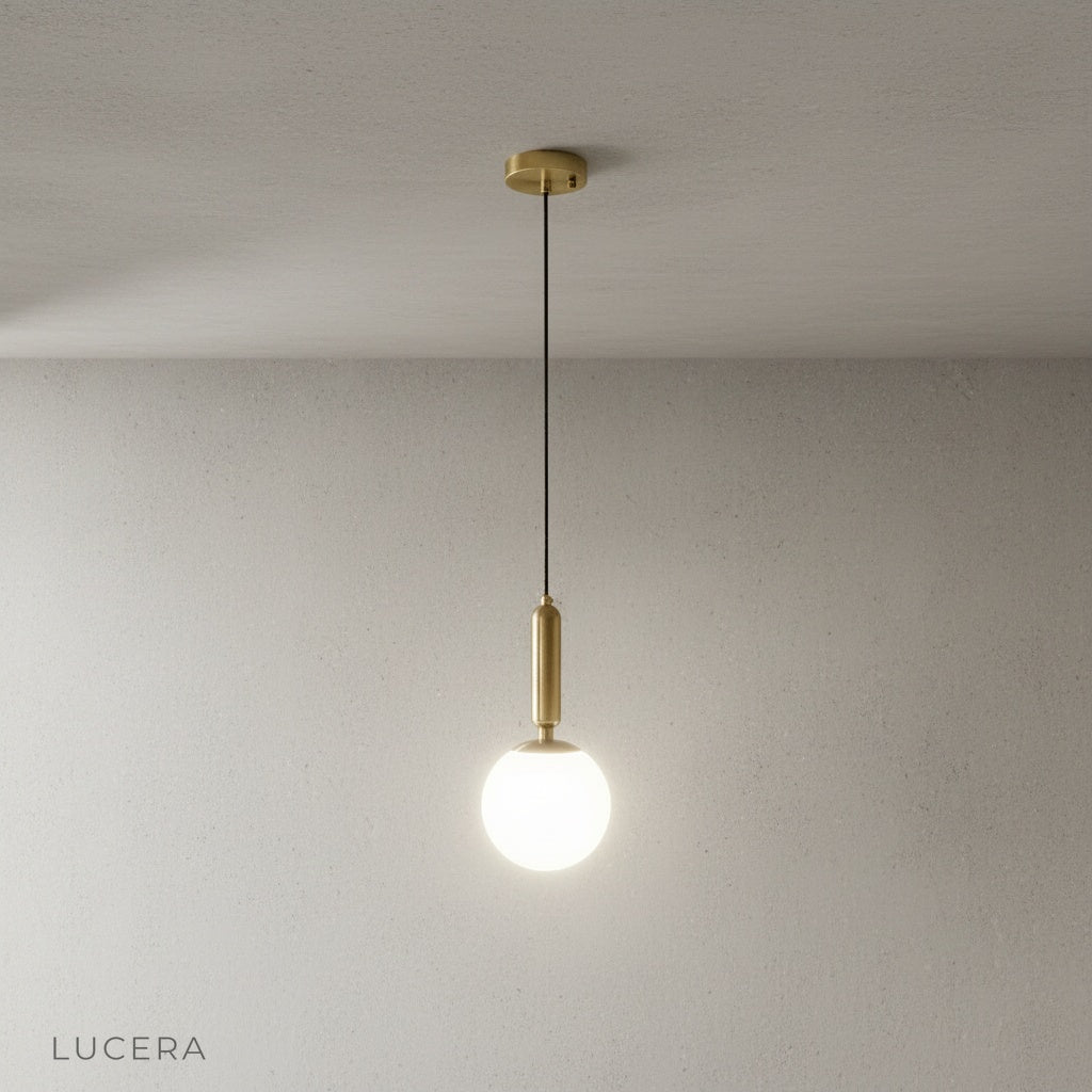 Close-up of Yvaine pendant light elegant metal finish and cable attachment