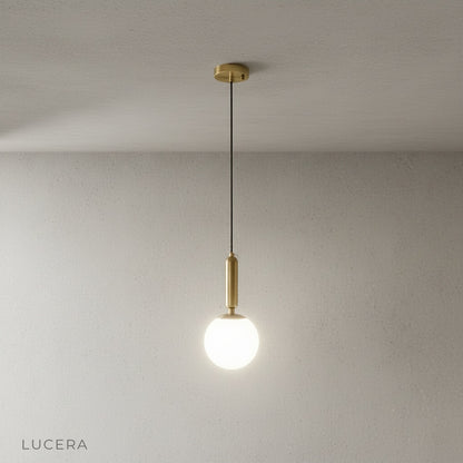 Close-up of Yvaine pendant light elegant metal finish and cable attachment