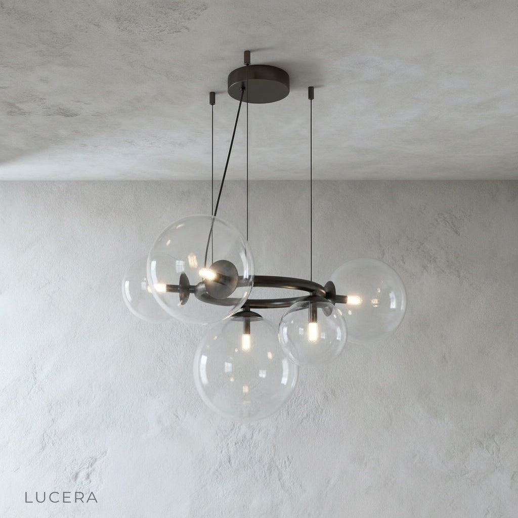 Close-up of Grenache chandelier glass sphere cluster refracting warm light
