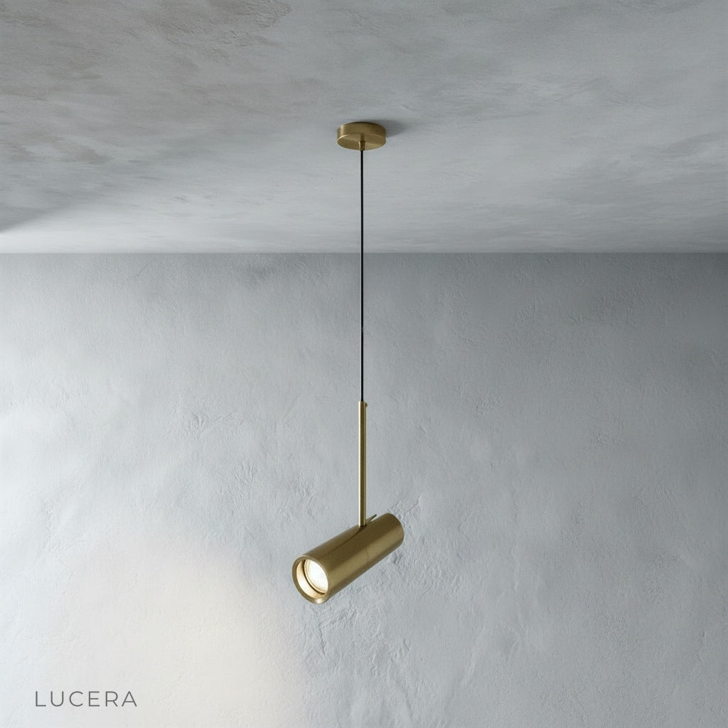 Minimalist studio view of Bistre dual-head pendant light showing brushed aluminum finish and adjustable cords