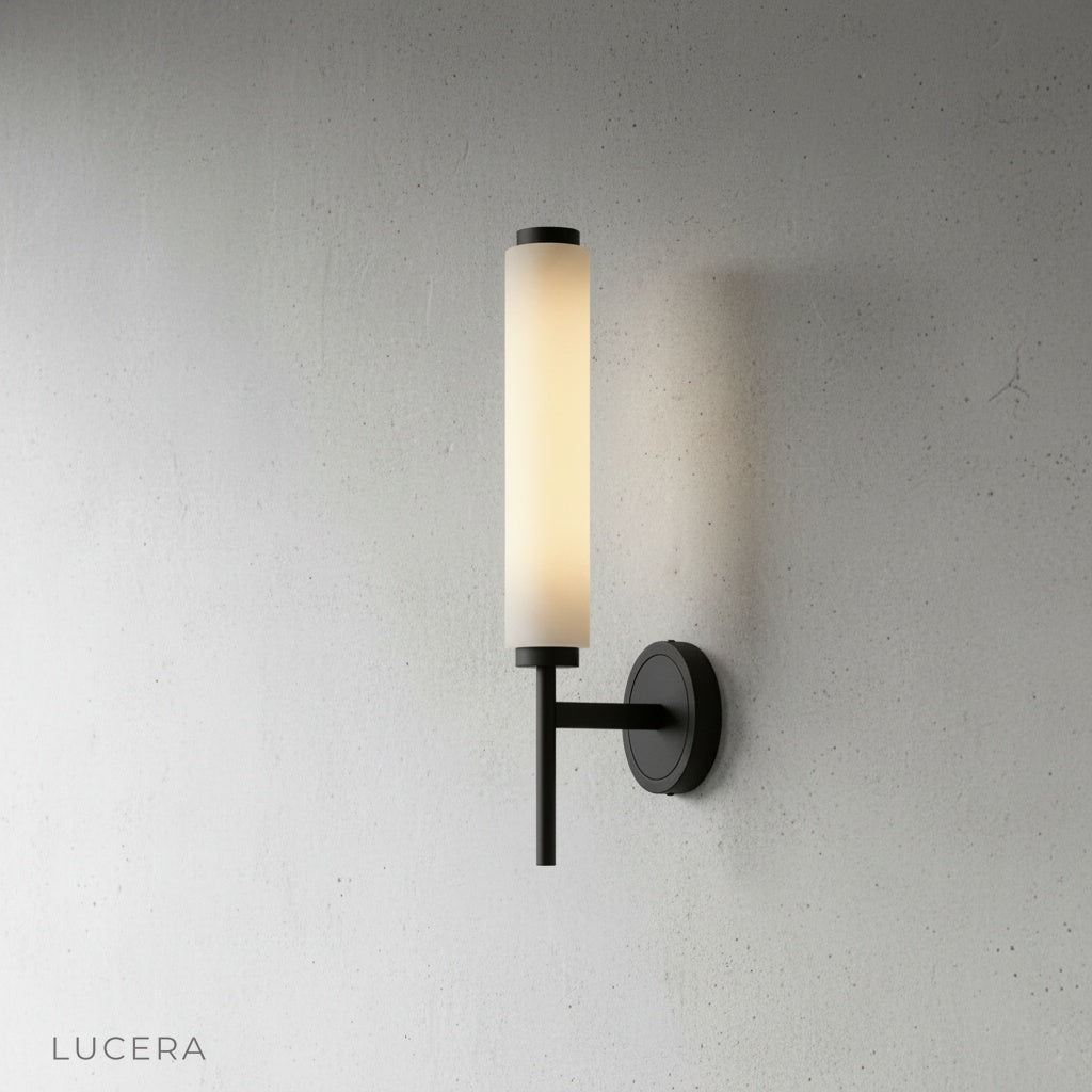 Close-up of Boreas wall lamp natural alabaster marble shade with visible veining and warm glow
