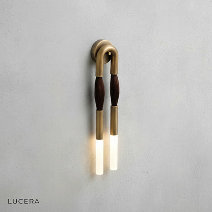 Regula silver finish wall lamp mounted on corridor wall with soft diffused light