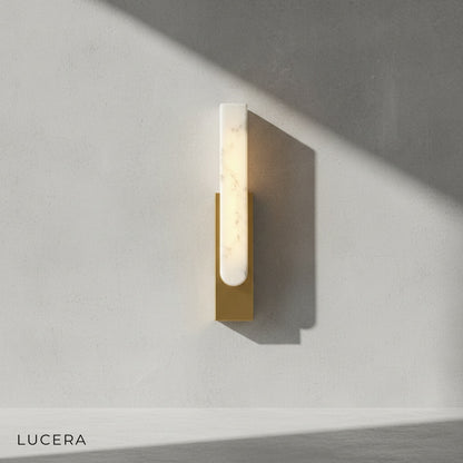 Column marble wall lamp side view showing sleek cylindrical silhouette