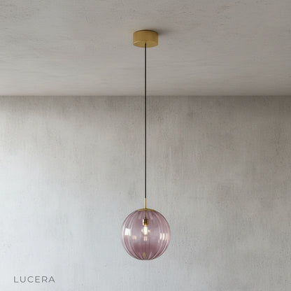 Close-up of textured stained glass panels on the Tramonto pendant light by Lucera