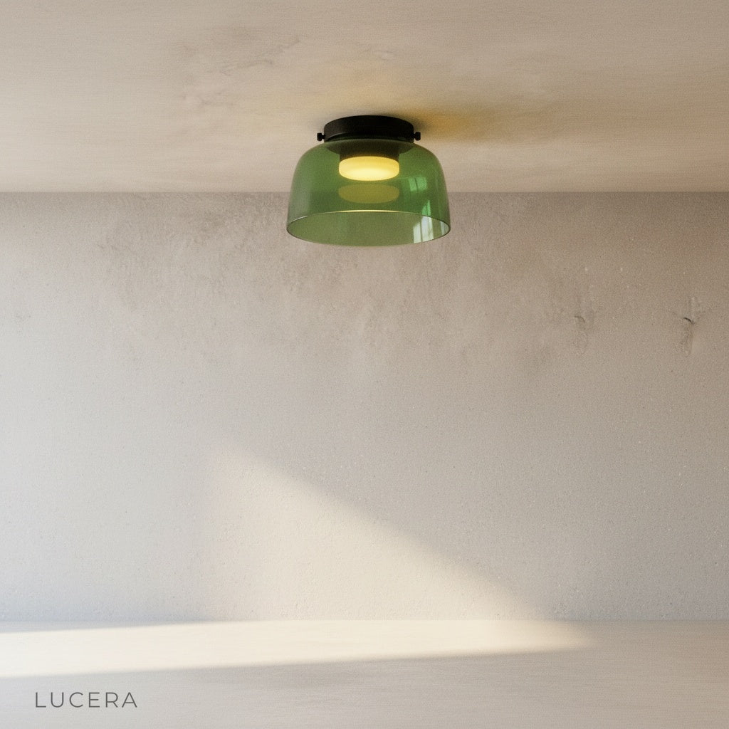 close-up of Desdemona ceiling light smoked glass texture and metal frame detail against white wall