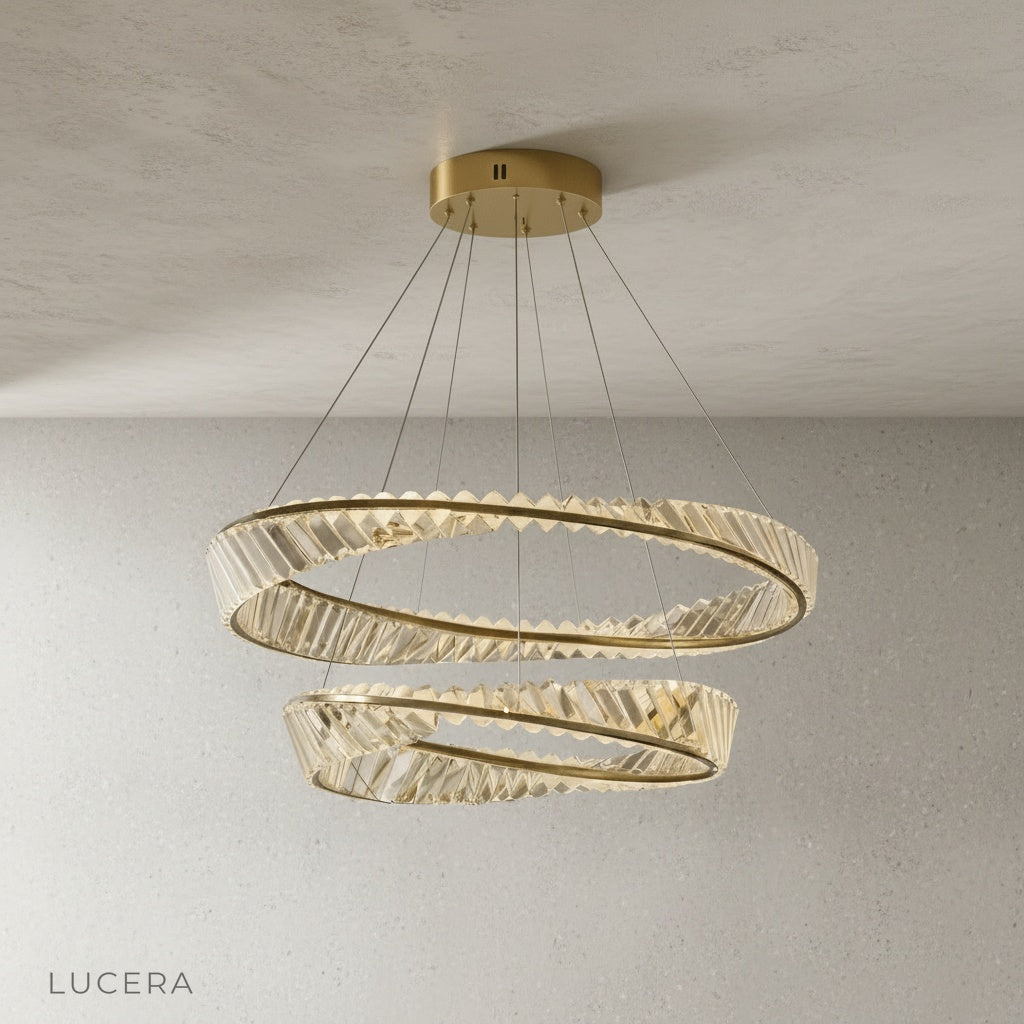 close-up detail of crystal lampshades and innovative light-refracting rings on Umbilicus chandelier