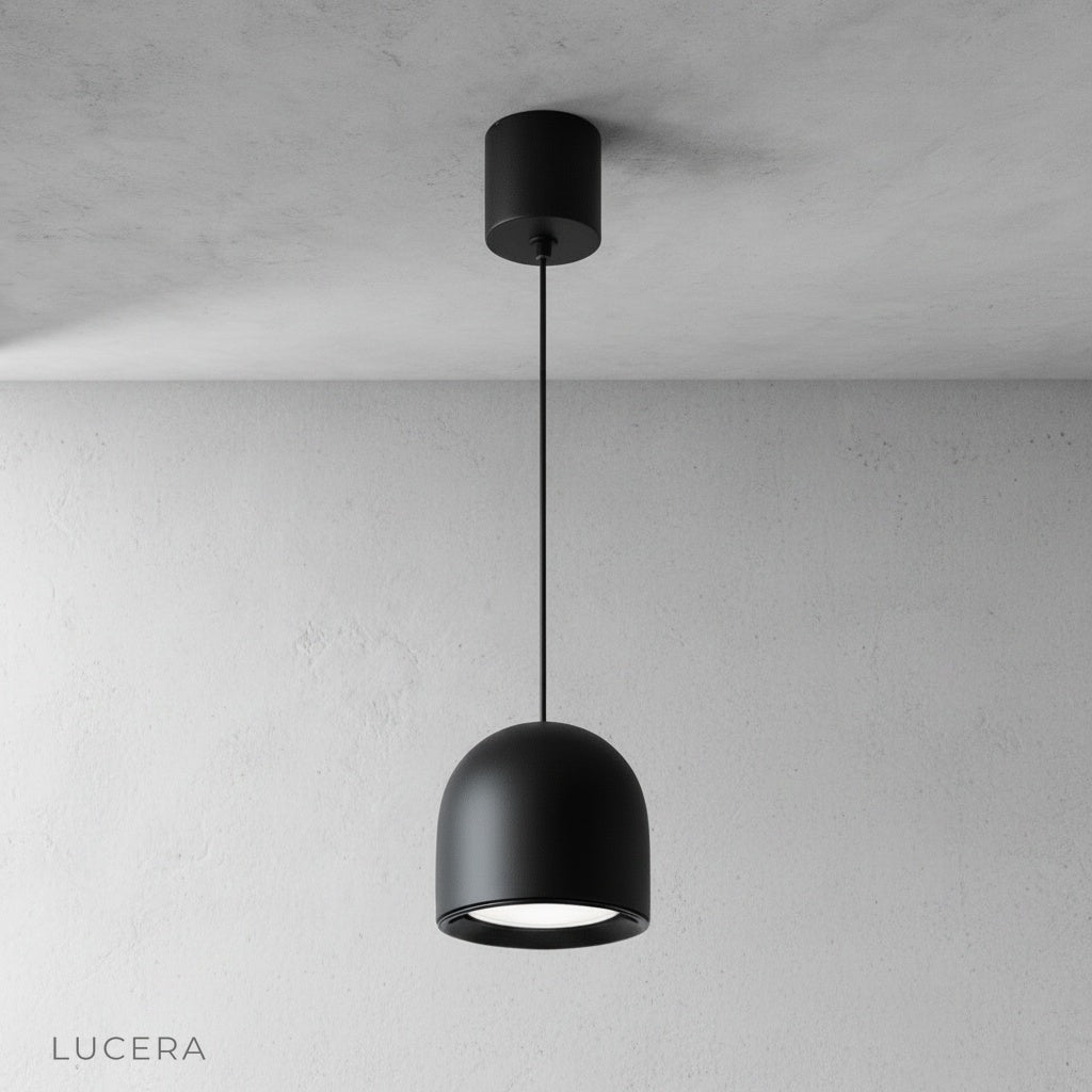 close-up of Trinity pendant light metallic rim reflecting warm light