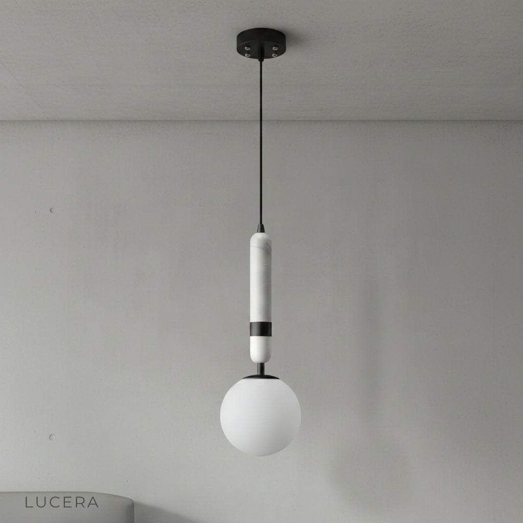 Close-up of copper accents and marble texture on Groove pendant light