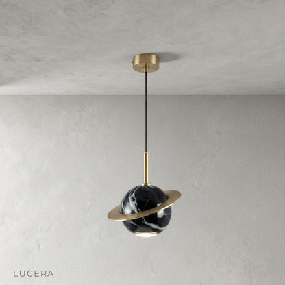 close-up of natural veining in green marble pendant light