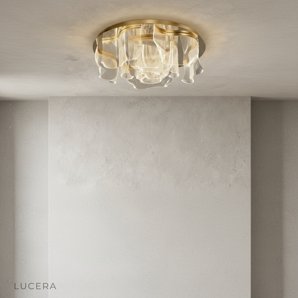Sisyphus ceiling light close-up detail integrated LED warm glow gold texture