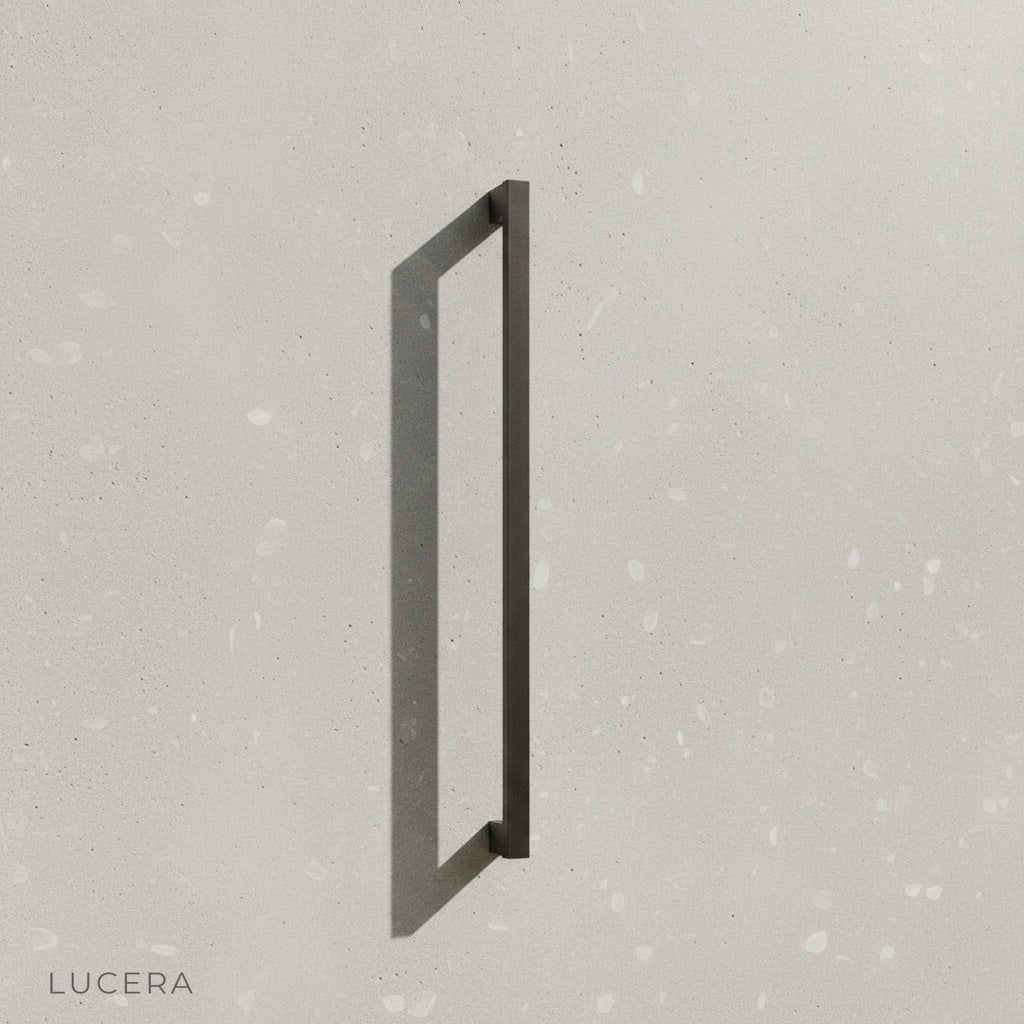 close-up of dark bronze finish on rectangular LED outdoor sconce