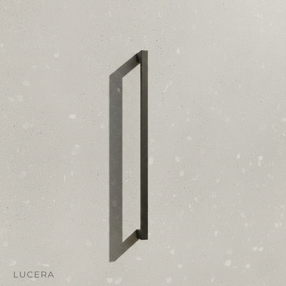 close-up of dark bronze finish on rectangular LED outdoor sconce