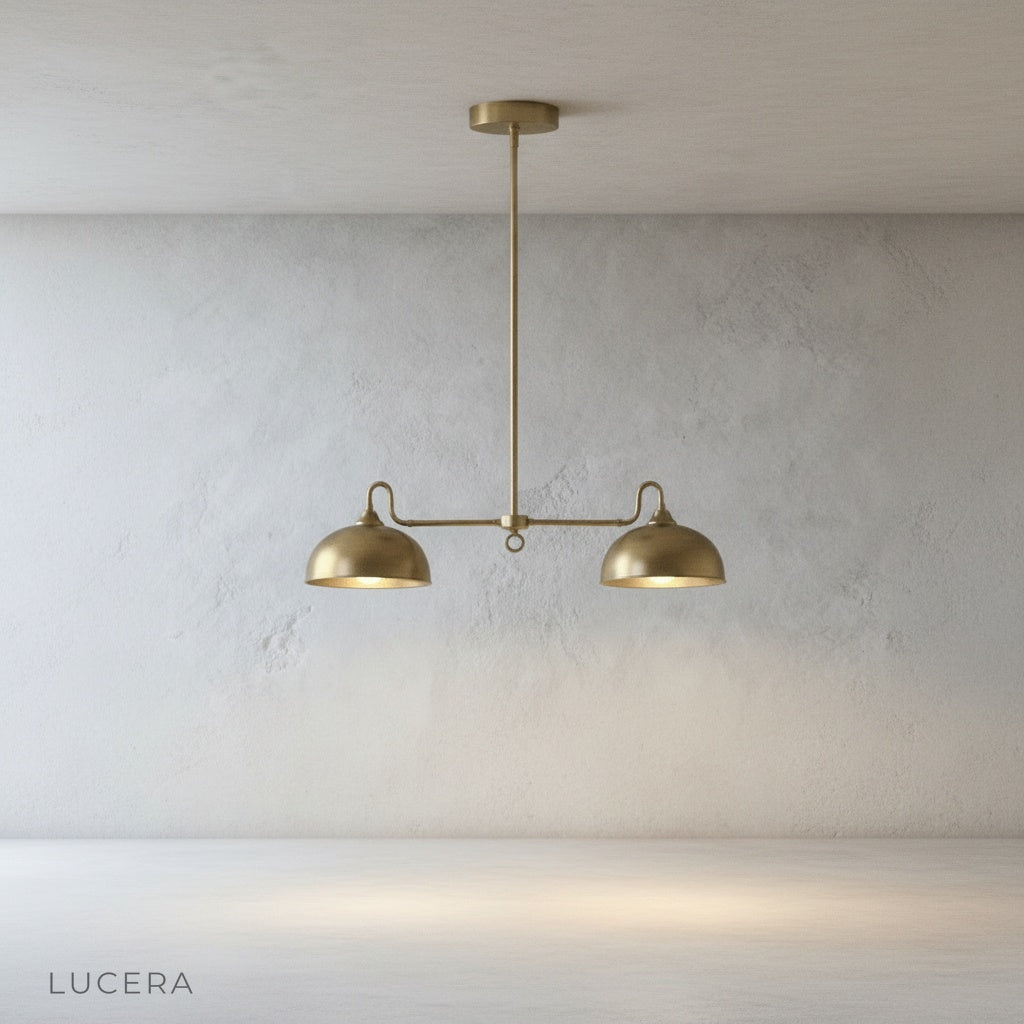 Montepulciano pendant light brass finish close-up of central stem and dome seam detail