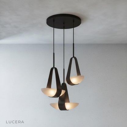 close-up of Talus pendant light leather strap and frosted glass diffuser texture