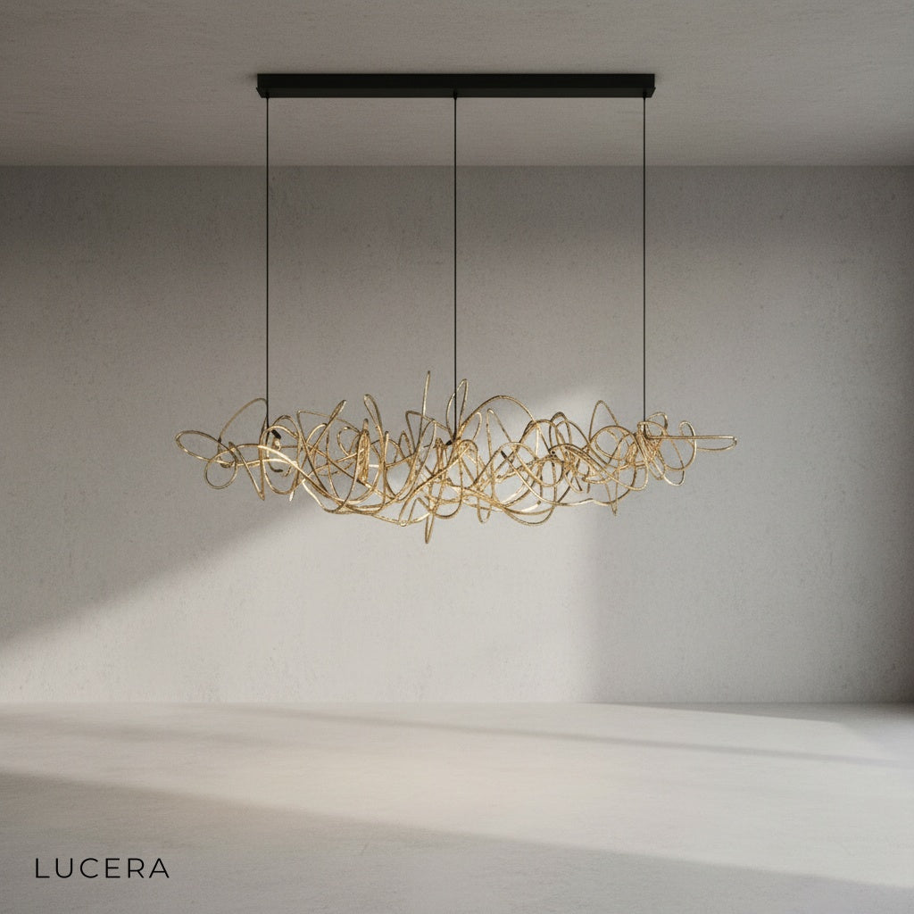 Isabelline rectangle chandelier in chrome finish hanging from ceiling in bright studio setting