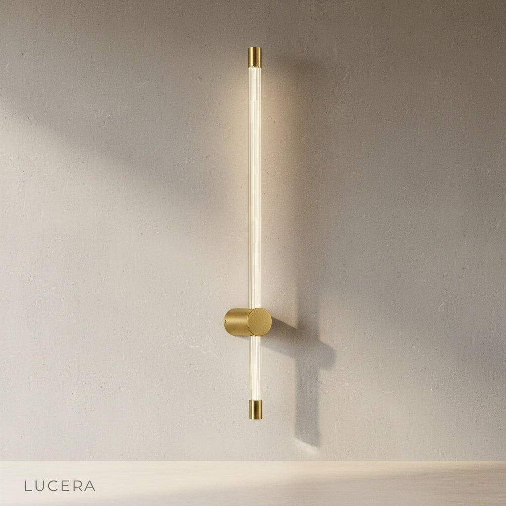 close-up of yoke wall lamp pivot joint and brushed metal finish detail