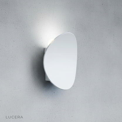 black and white finish wall lamp detail showing sleek curved arm