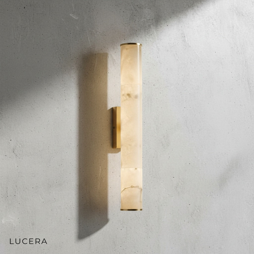 Ethos wall lamp with LED wedge bulb set to warm white color temperature in minimal interior