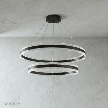 Close-up of Bacchus Round Chandelier metal ring and light bulbs with soft warm glow