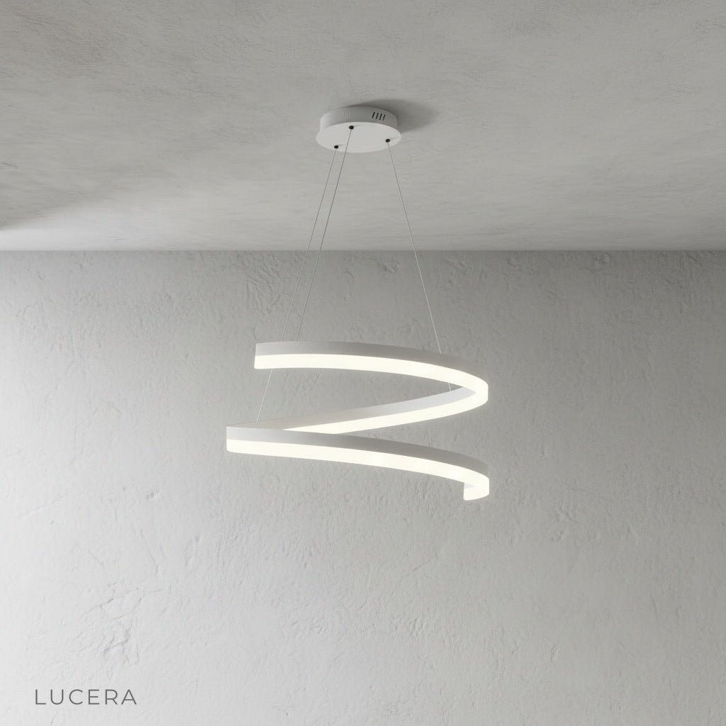 Front view of sculptural ribbon-like Hypnotize pendant light with integrated LED glow