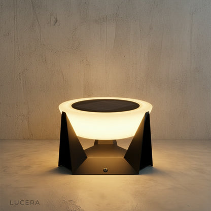 studio view of Wilhelmina solar lamp side profile with subtle textured metal finish