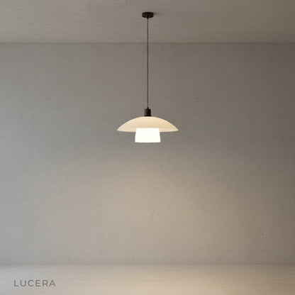Close-up of Eburnean pendant light frosted glass diffuser and matte black iron suspension