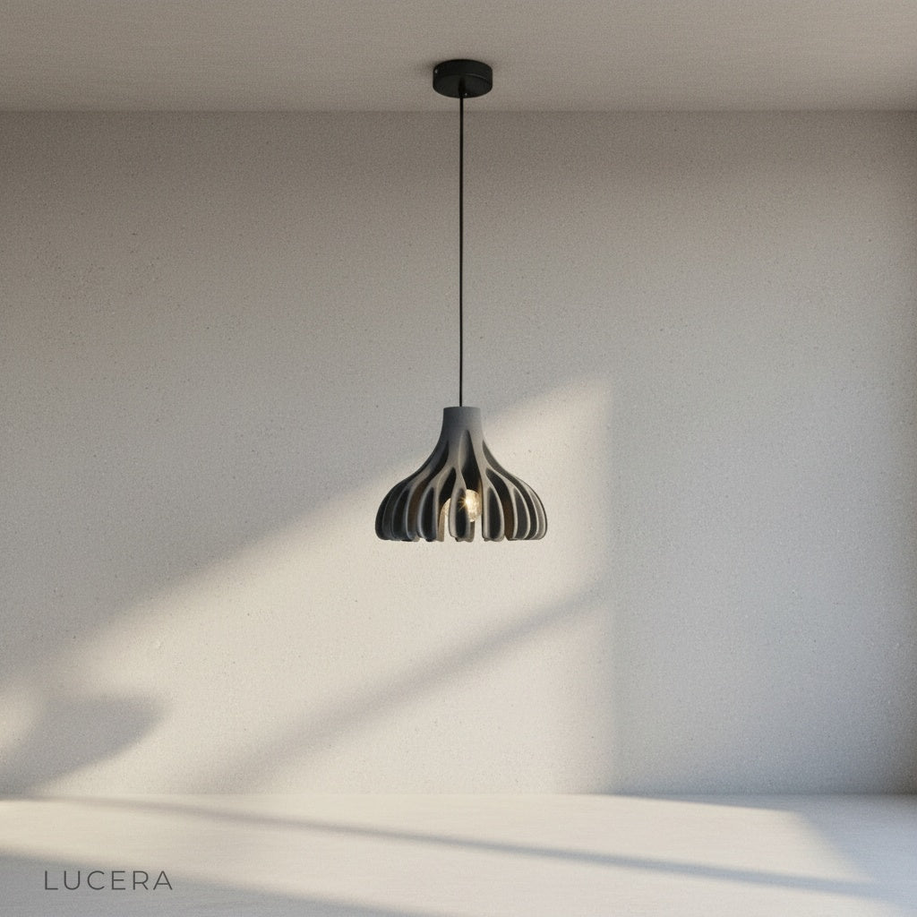 Close-up of coral texture on Thibault pendant light shade in warm light