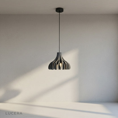 Close-up of coral texture on Thibault pendant light shade in warm light