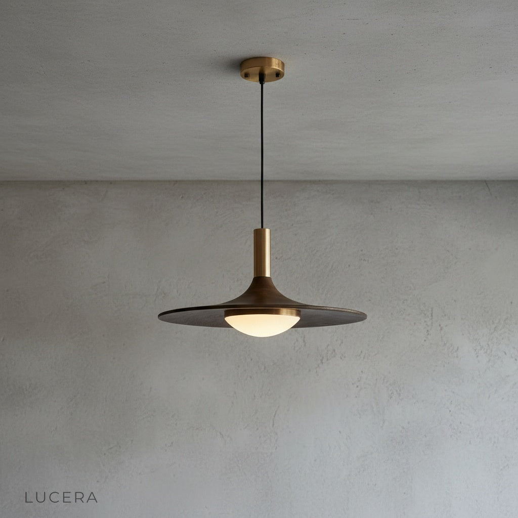 close-up studio view of Juju pendant light showing sculptural silhouette and soft glow