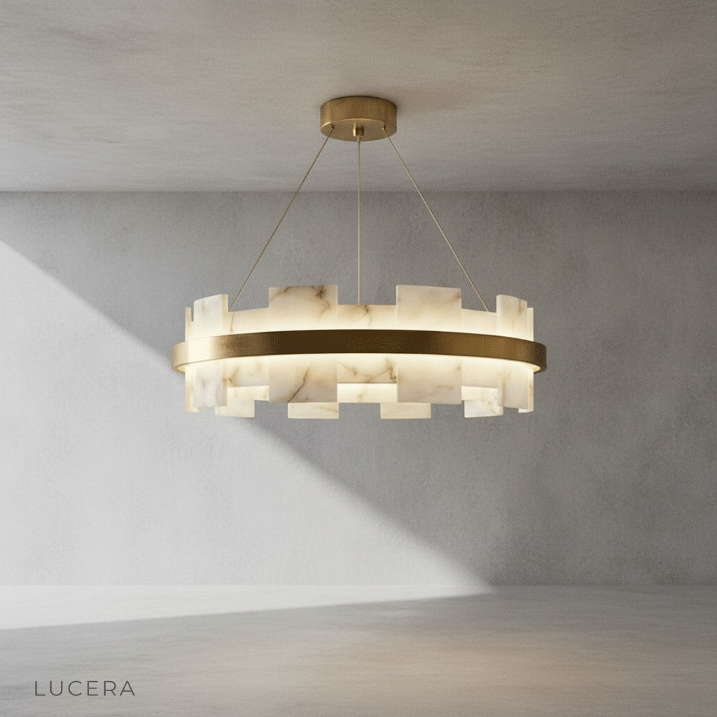 close-up detail of Ablution chandelier alabaster shade with natural veining and warm copper ring accent