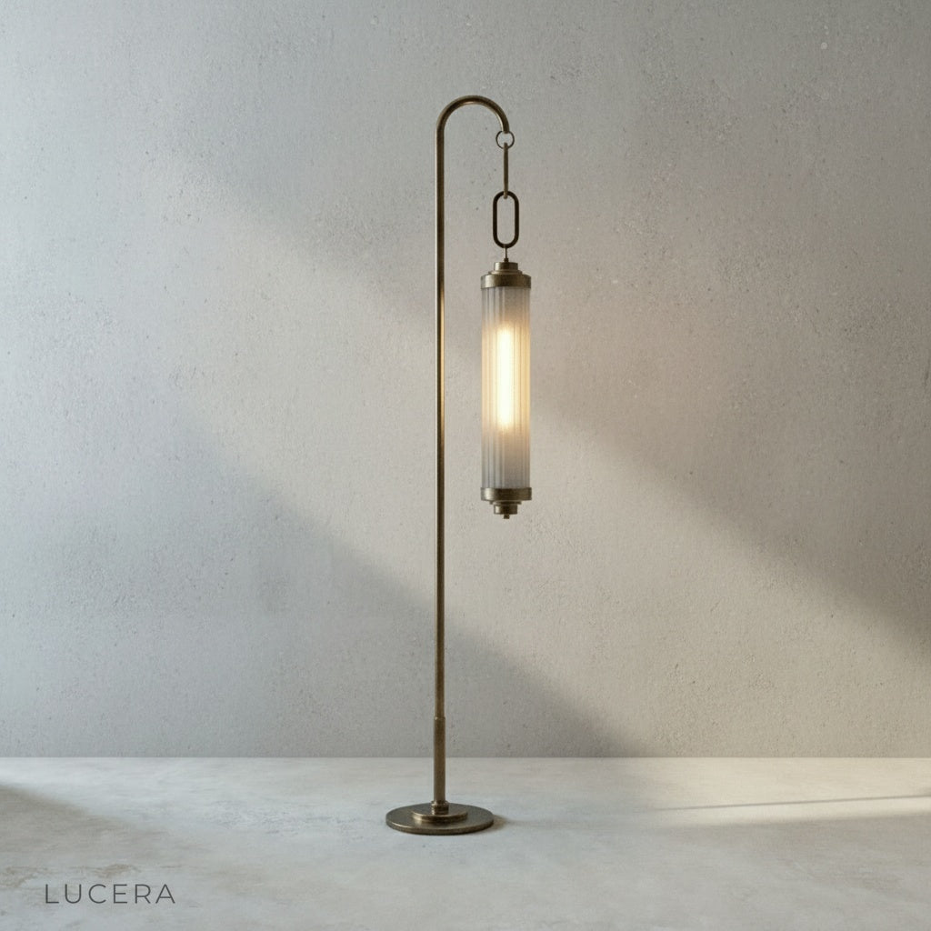 close-up of fluted glass cylinder shade with warm 2700K glow