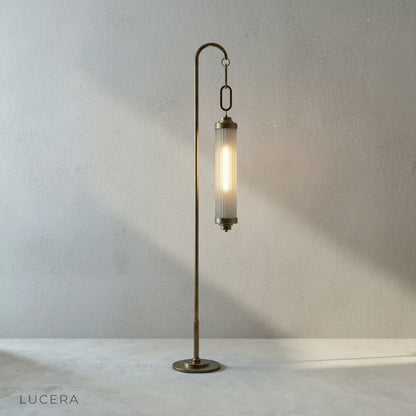 close-up of fluted glass cylinder shade with warm 2700K glow