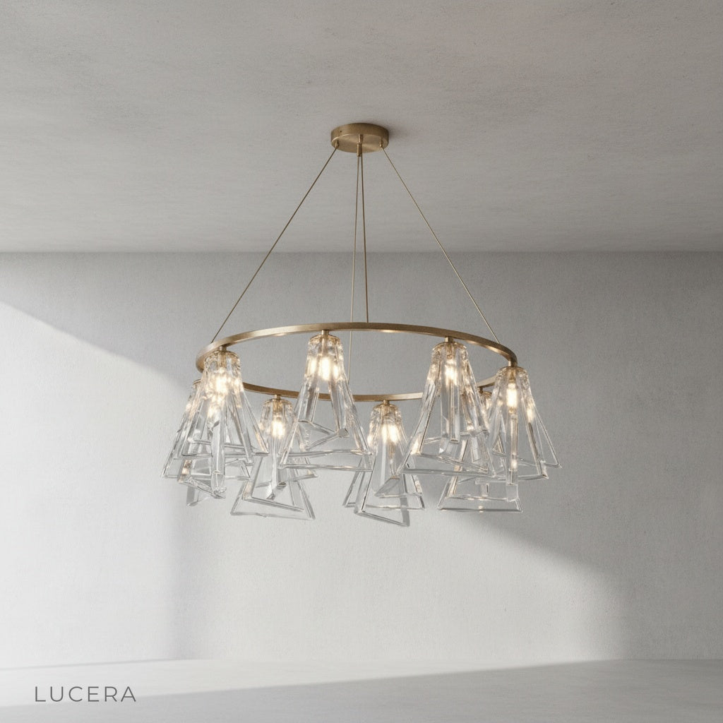 Close-up detail of Bruma Chandelier copper frame joints and faceted crystal glass shades