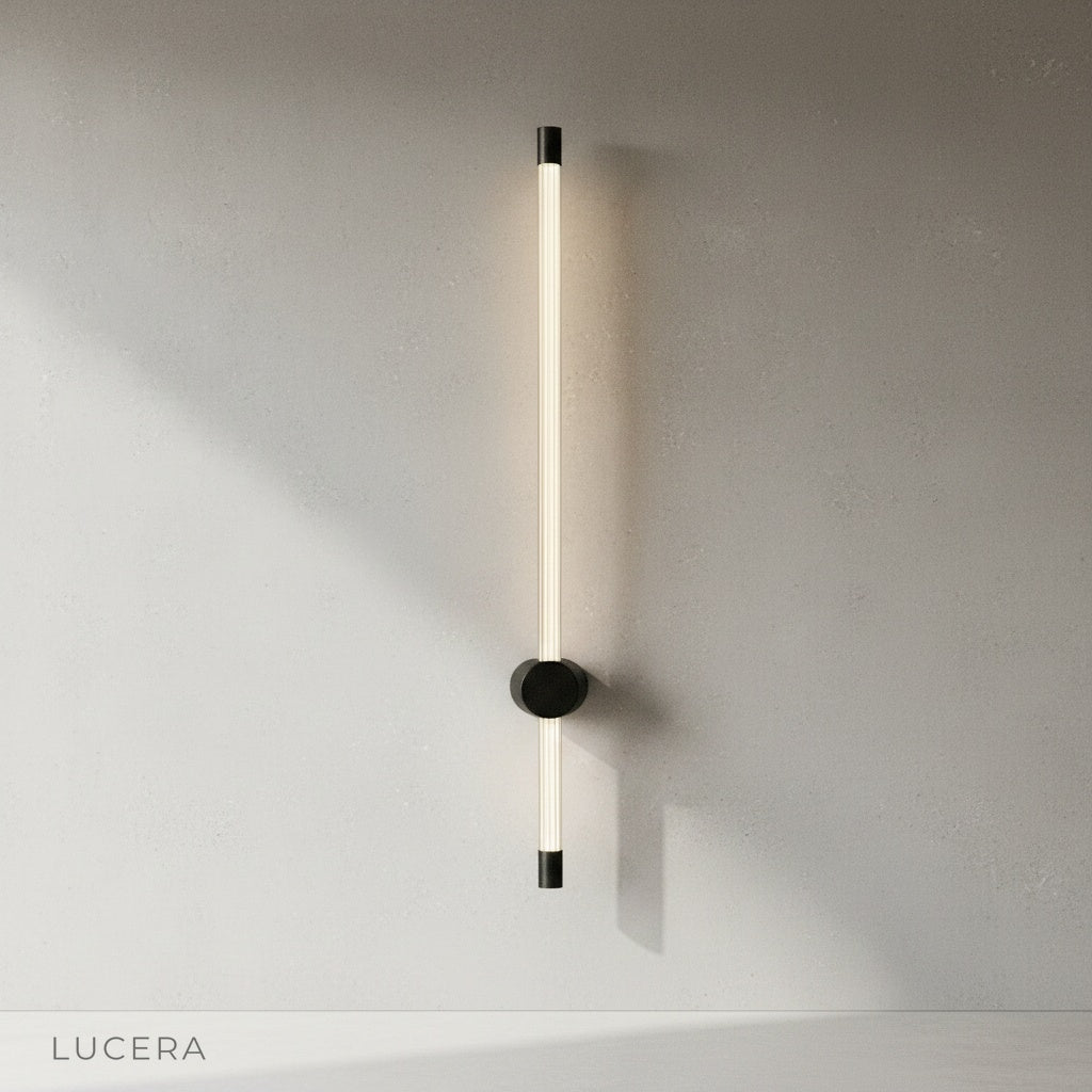 yoke wall lamp in warm white light beside a hallway mirror and wooden bench