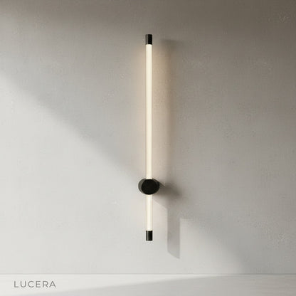 yoke wall lamp in warm white light beside a hallway mirror and wooden bench