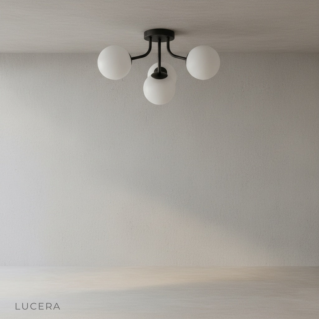 Crypt ceiling light in matte black finish with frosted glass shades for bedroom