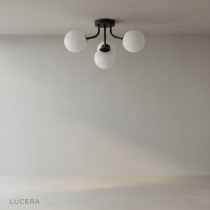 Crypt ceiling light in matte black finish with frosted glass shades for bedroom