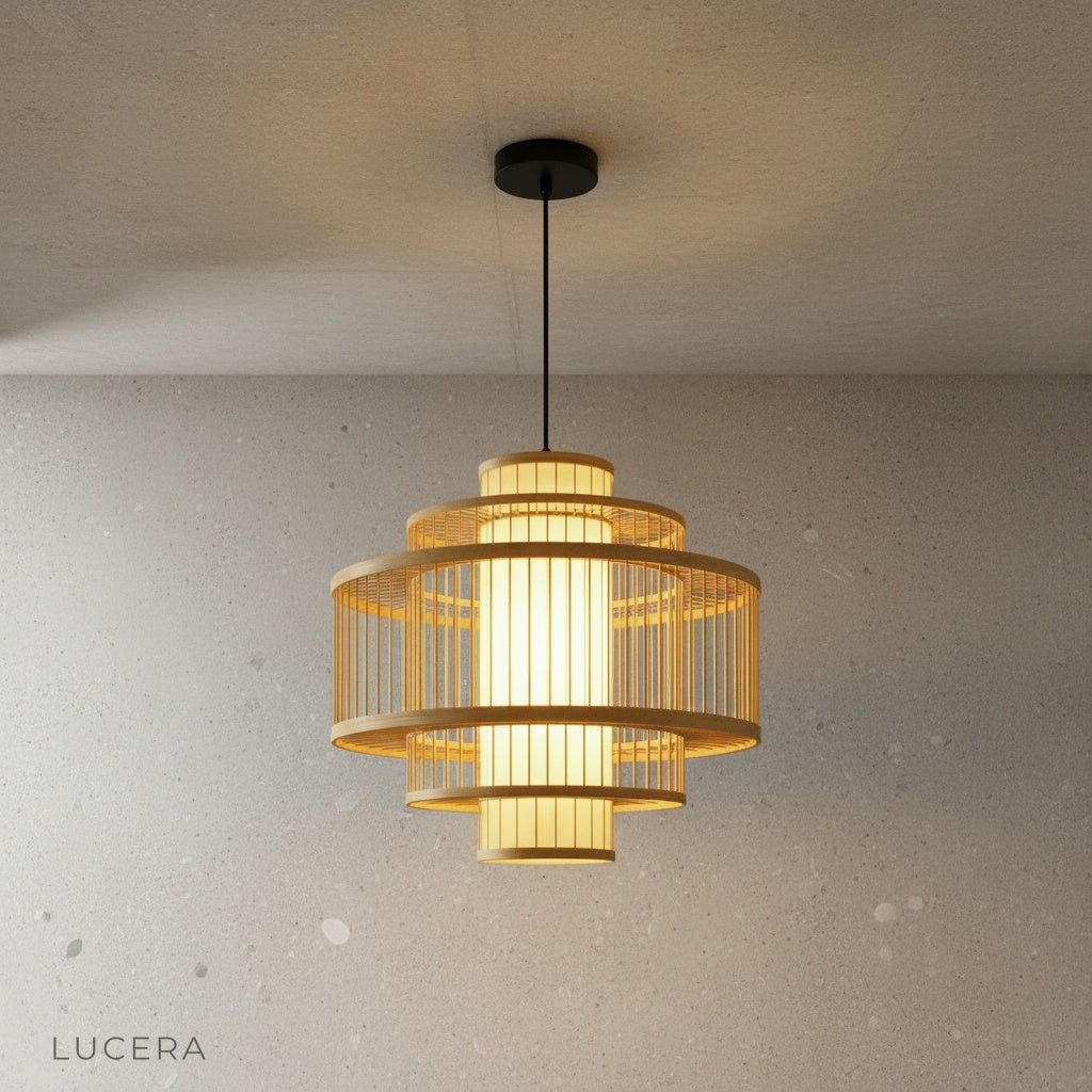 pair of rattan pendant lights hanging at different heights in warm neutral dining room