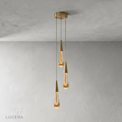 Beryl pendant light chrome-plated gold exterior hanging in bright dining room