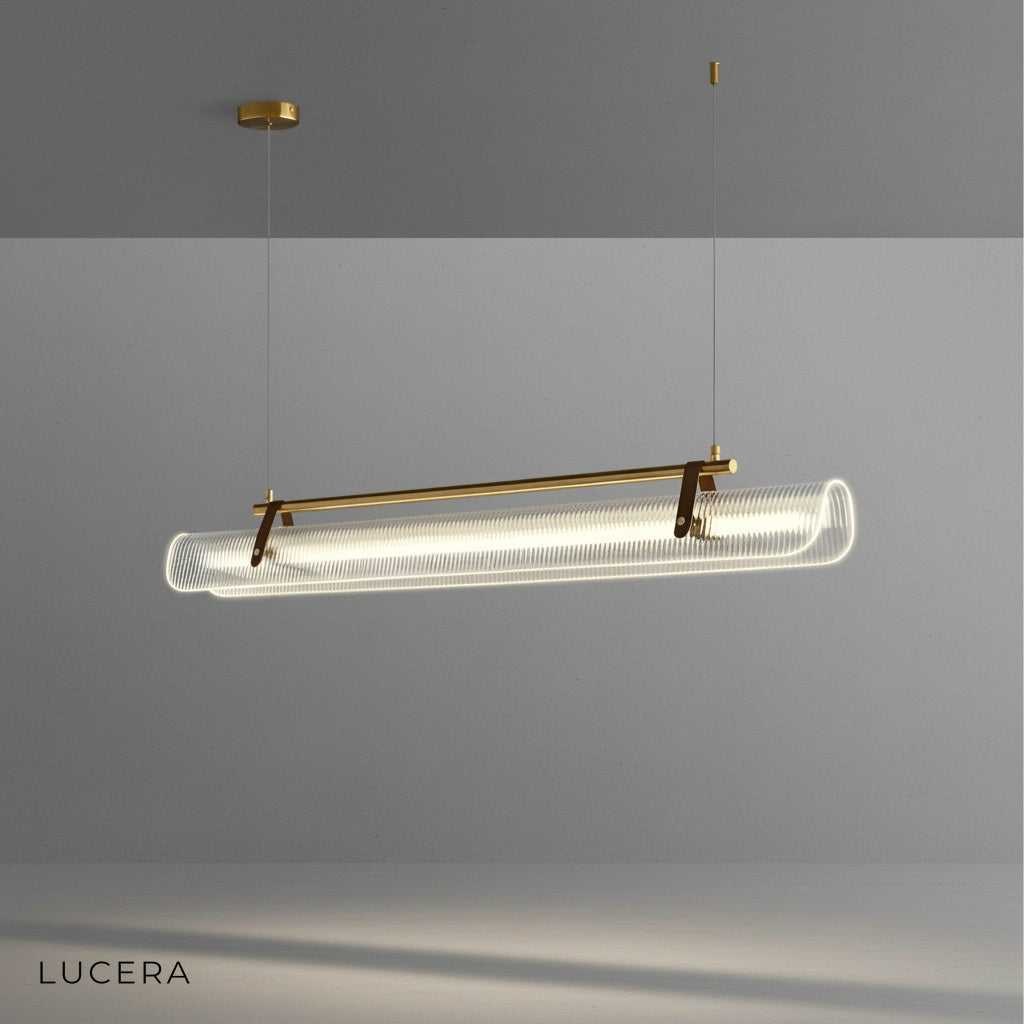 Close-up of gold acrylic panel edge catching light on Naphthol chandelier, metal frame visible