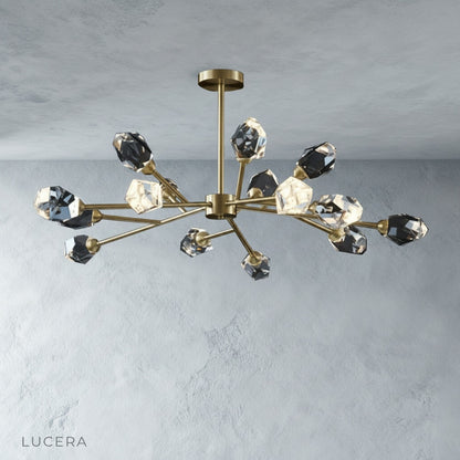 close-up of cassia chandelier crystal details with soft light reflecting through prisms