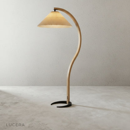Close-up of Yorick Floor Lamp pleated empire cloth shade diffusing warm light