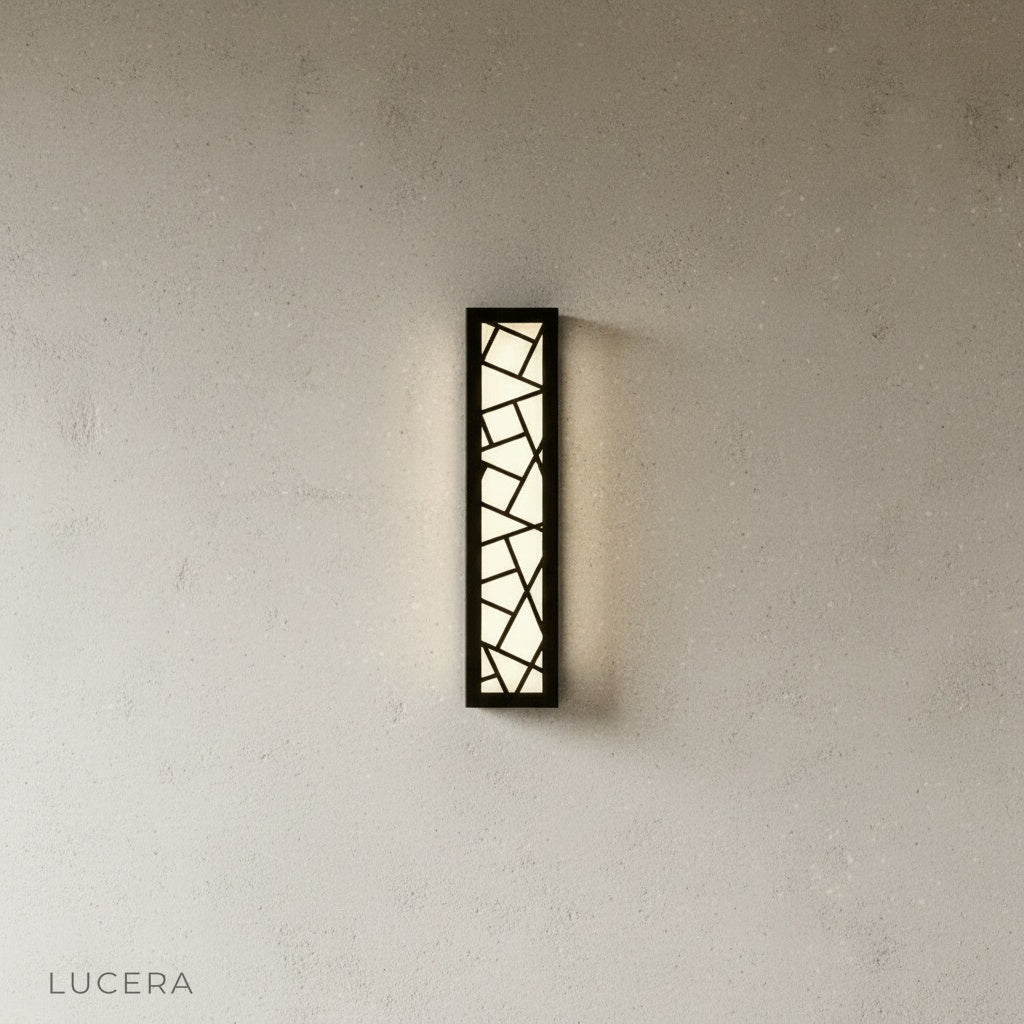 Emblem Wall Lamp in a warm finish adding elegance to a garden entrance